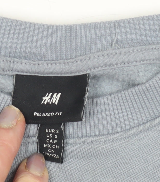 Close-up detail of H&M Grey Relaxed Fit unisex sweatshirt, s
