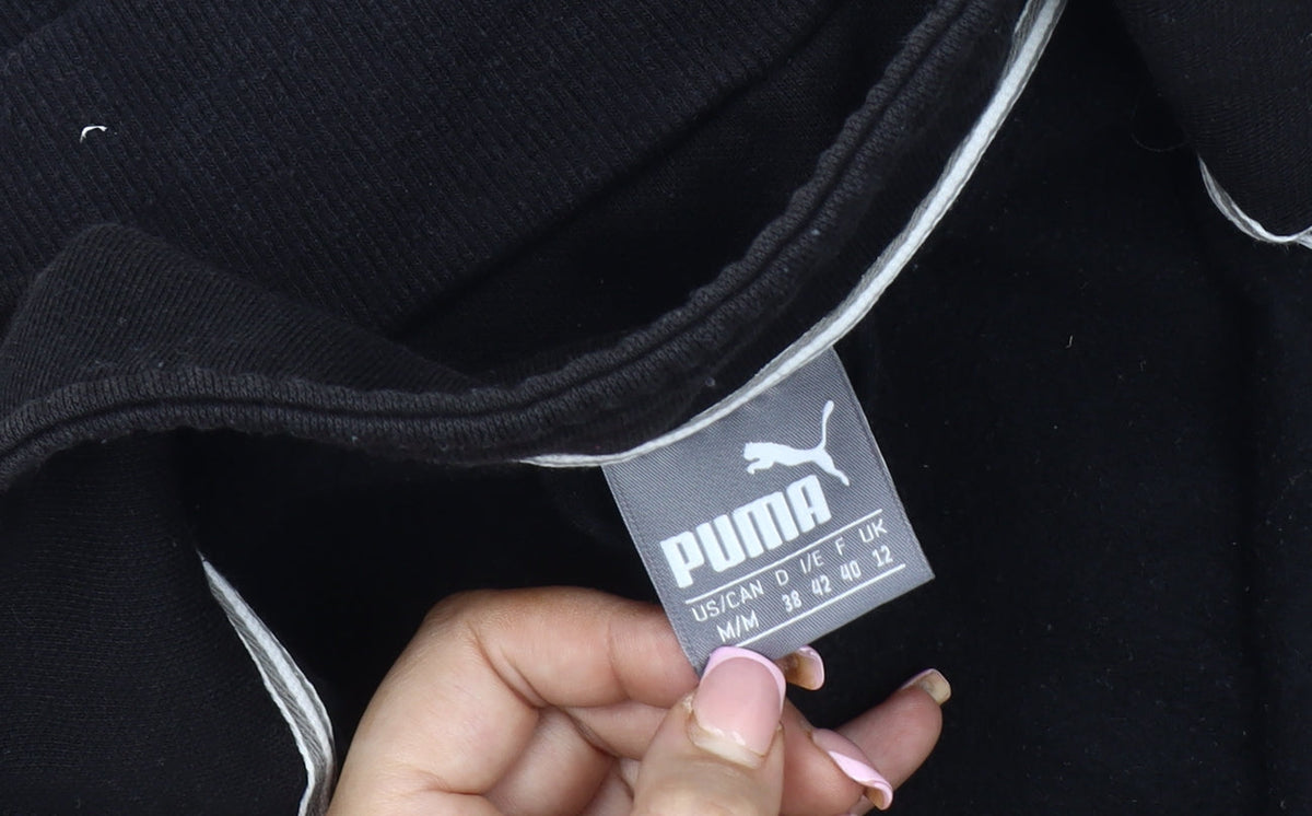 Close-up detail of Puma Women's Black Jacket, size 12, Casual Sports Style