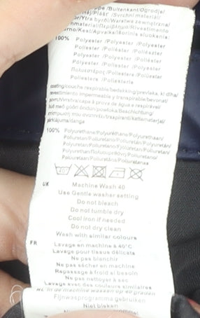 Brand and care label for Gelert unisex waterproof blue rain coat m
