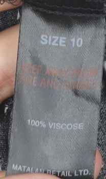 Brand and care label for Papaya Women's Black Polka Dot A-Line Dress, size 10