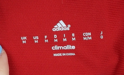 Brand and care label for Adidas Men's Red Polo Shirt Medium Jersey