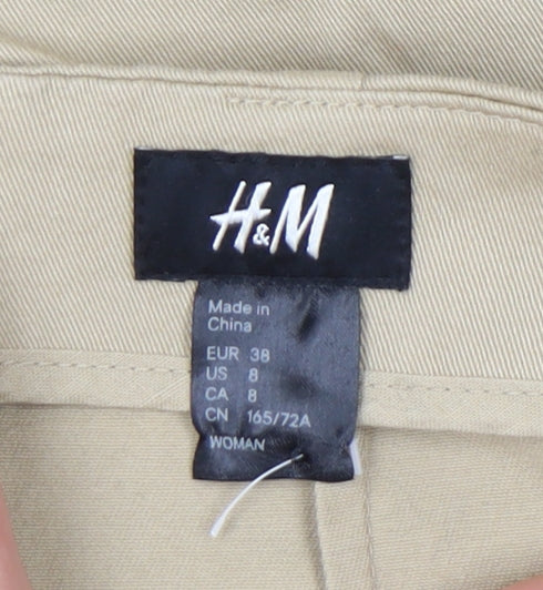 Close-up detail of H&M Women's Beige Pencil Skirt, size 10, Casual, Mid Rise