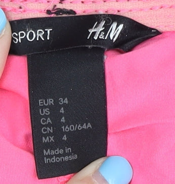 Brand and care label for H&M Women Black Athletic Shorts, size 6