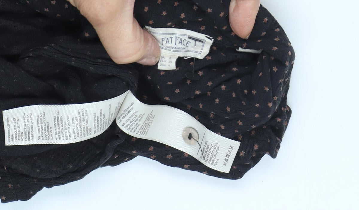 Close-up detail of FatFace Women's Black Shirt Dress, size 6, Polka Dot