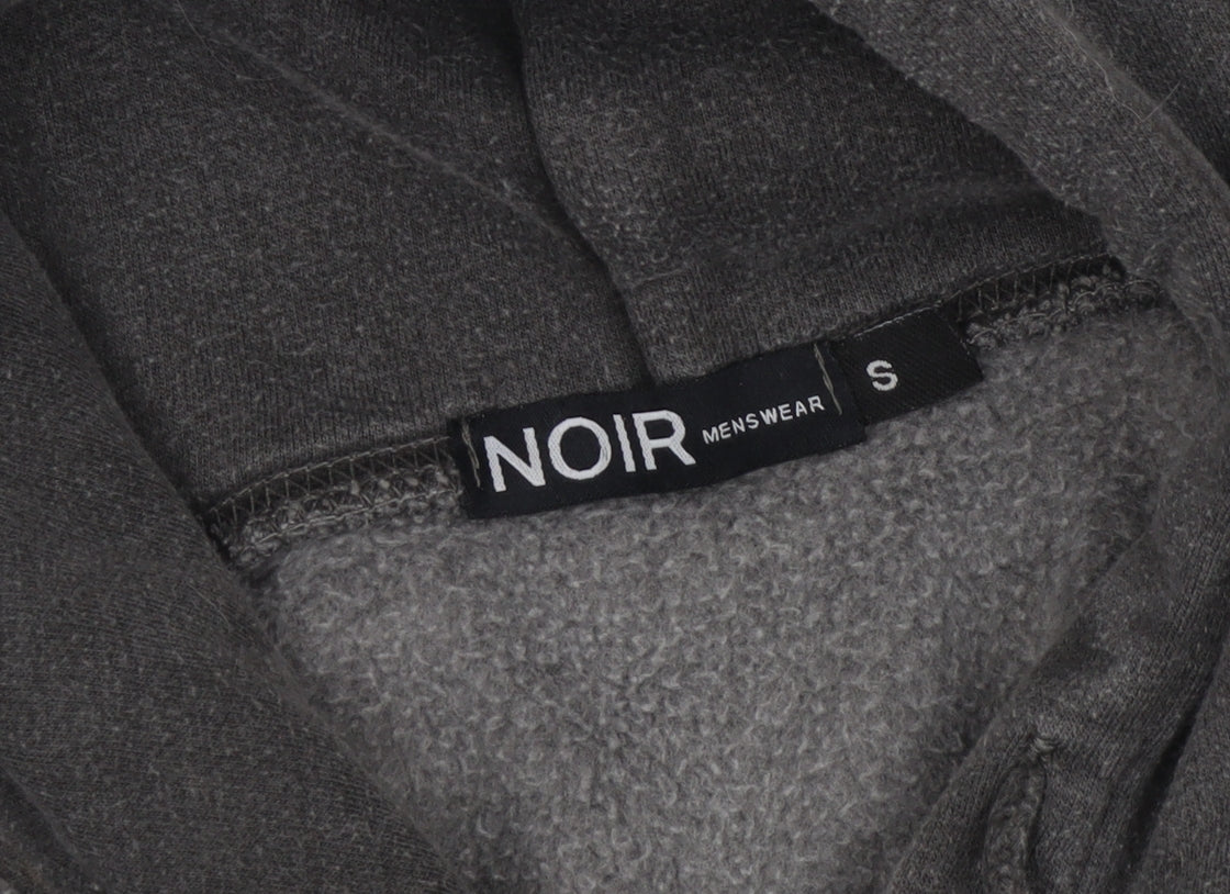 Close-up detail of Noir Menswear unisex hoodie black s pullover graphic