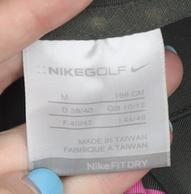 Brand and care label for Nike Women's Green Polo Shirt, size 10, Golf Pullover