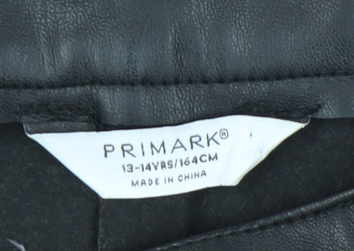 Brand and care label for Primark girls’ black faux leather dress pants 13-14 years