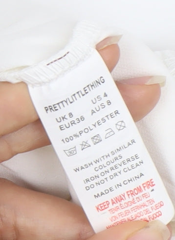 PrettyLittleThing Women’s White Size 8 Sleeveless Button Jumpsuit