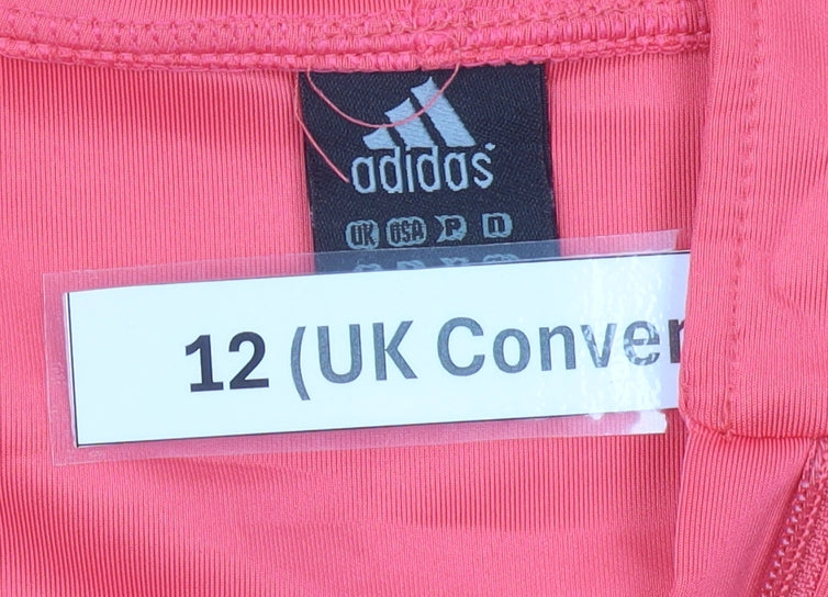 Brand and care label for Adidas women’s pink henley hoodie, size UK 12, with logo detail
