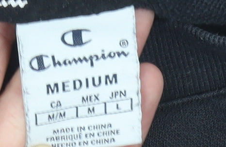 Brand and care label for Champion boys’ black medium pullover sweatshirt crew neck logo graphic