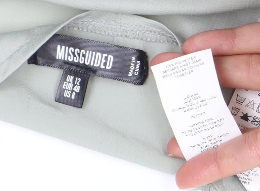 Brand and care label for Missguided Women’s Green Wrap Dress, size UK 12, Puff Sleeve V-Neck