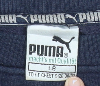 Brand and care label for Puma boys’ blue crew neck logo pullover sweatshirt lb 11-12 years