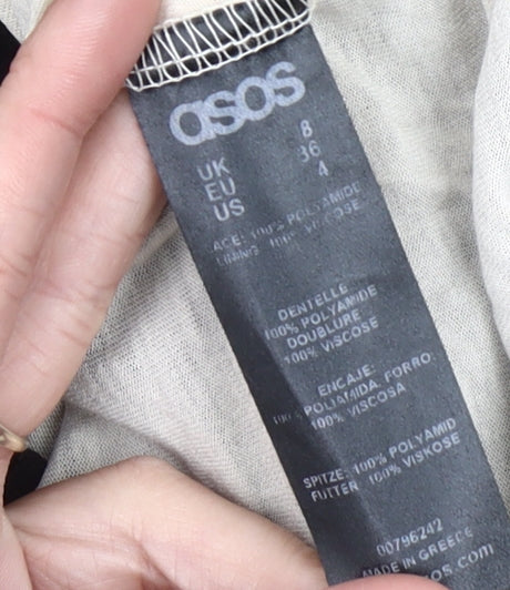 Brand and care label for ASOS Women Black, size 8, Floral Lace Skater Party Cocktail Dress