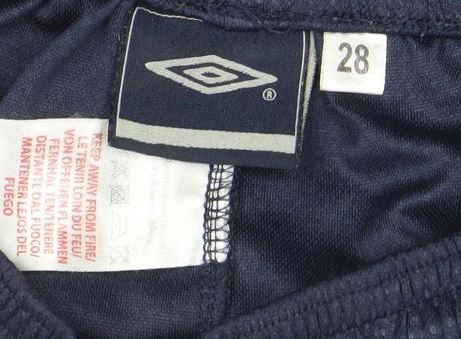 Brand and care label for Umbro boys’ blue 28in athletic football shorts lightweight mesh
