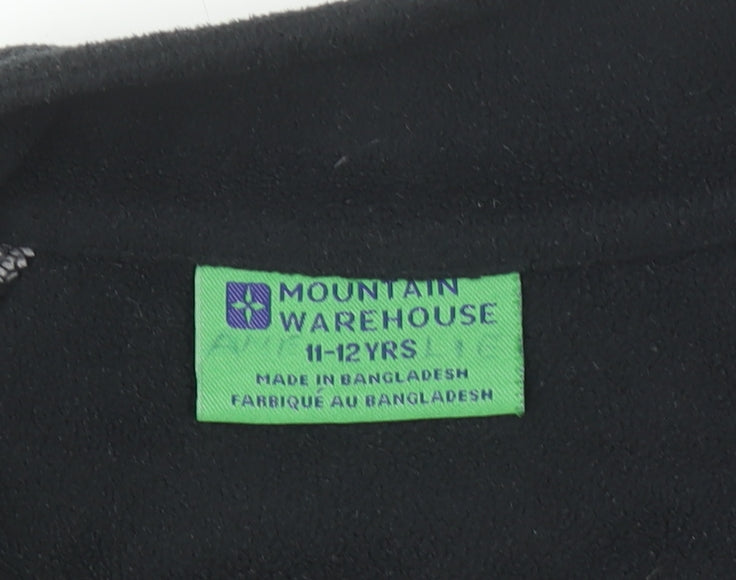Brand and care label for Mountain Warehouse boys’ black fleece 1/4 zip pullover sweatshirt 11-12 years