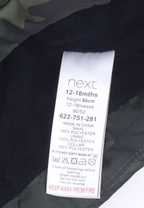 Brand and care label for Next unisex baby green camouflage puffer waistcoat 12-18 months