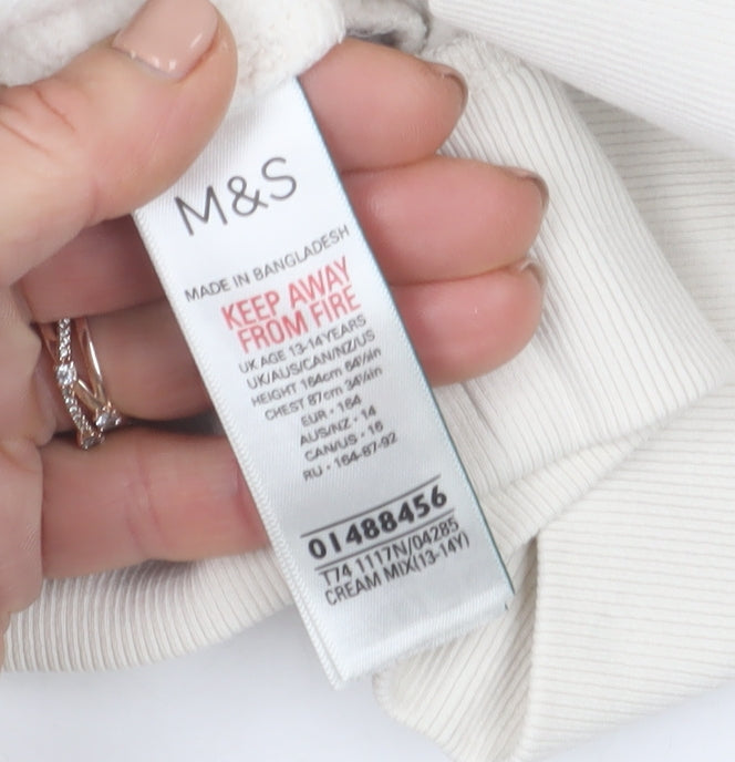 Brand and care label for Marks & Spencer girls’ beige graphic sweatshirt 13-14 years crew neck