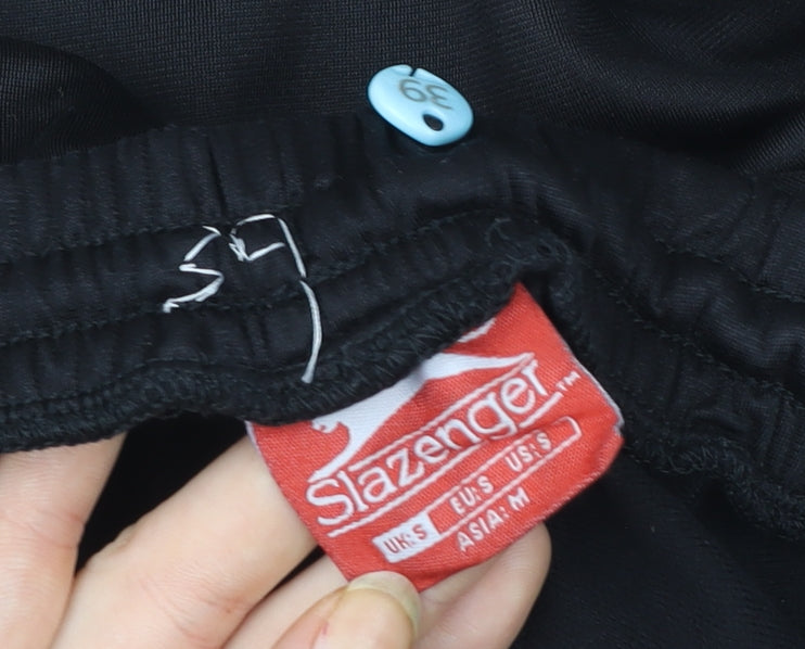 Brand and care label for Slazenger boys’ black s track pants lightweight sports trousers