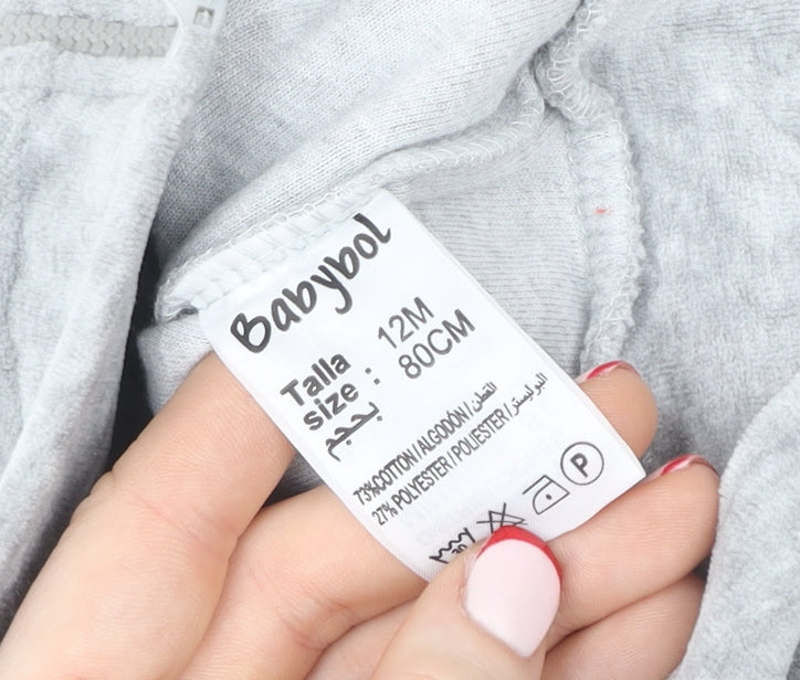 Brand and care label for Babybol unisex grey hooded full zip jungle adventure jumper 12-18 months