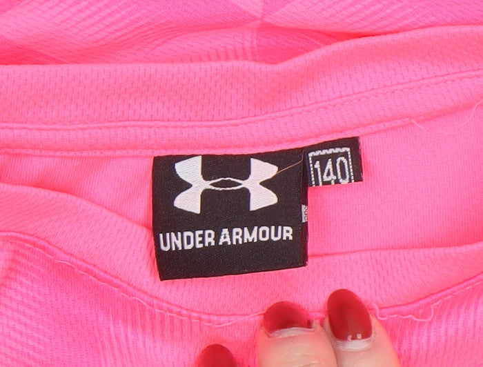 Brand and care label for Under Armour boys’ pink short sleeve athletic t-shirt, size 140, (12-13 years)