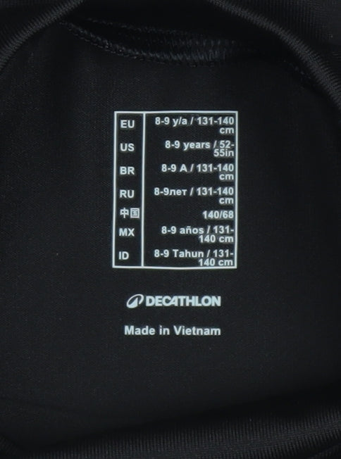 Brand and care label for Decathlon boys’ black long sleeve athletic mock neck top 8-9 years