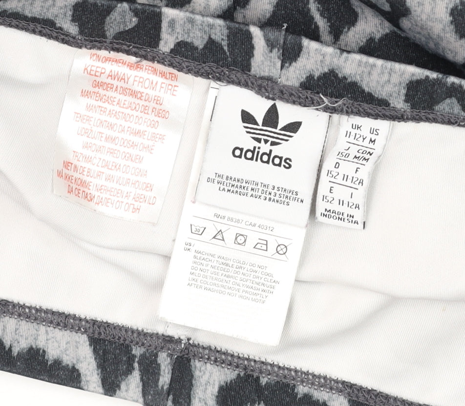 Brand and care label for adidas girls’ grey leopard print 3-stripes leggings 11-12 years