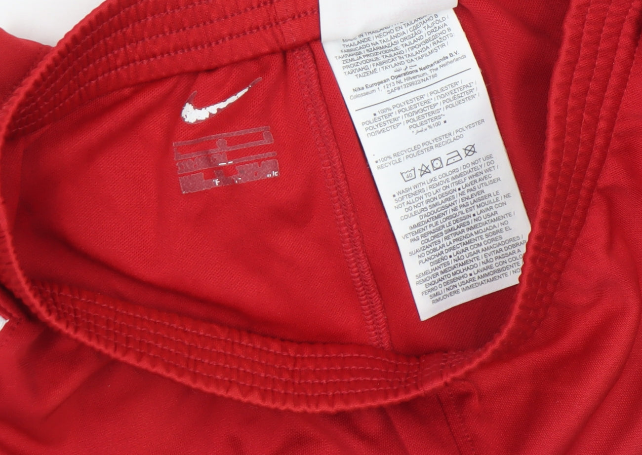 Brand and care label for Nike boys’ red lfc football athletic shorts, size M, polyester activewear