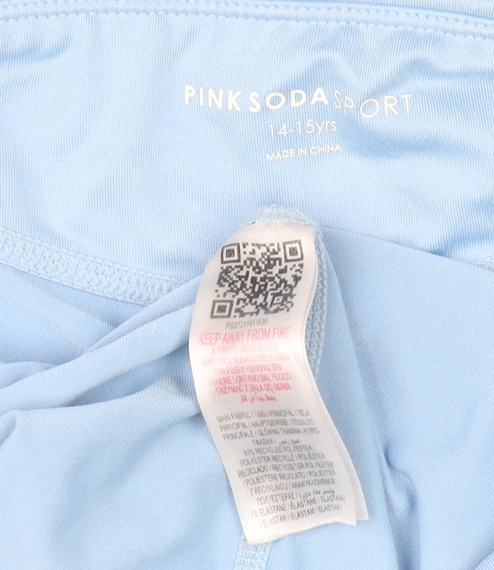 Brand and care label for Pink Soda Sport girls’ blue ankle leggings 14-15 years activewear