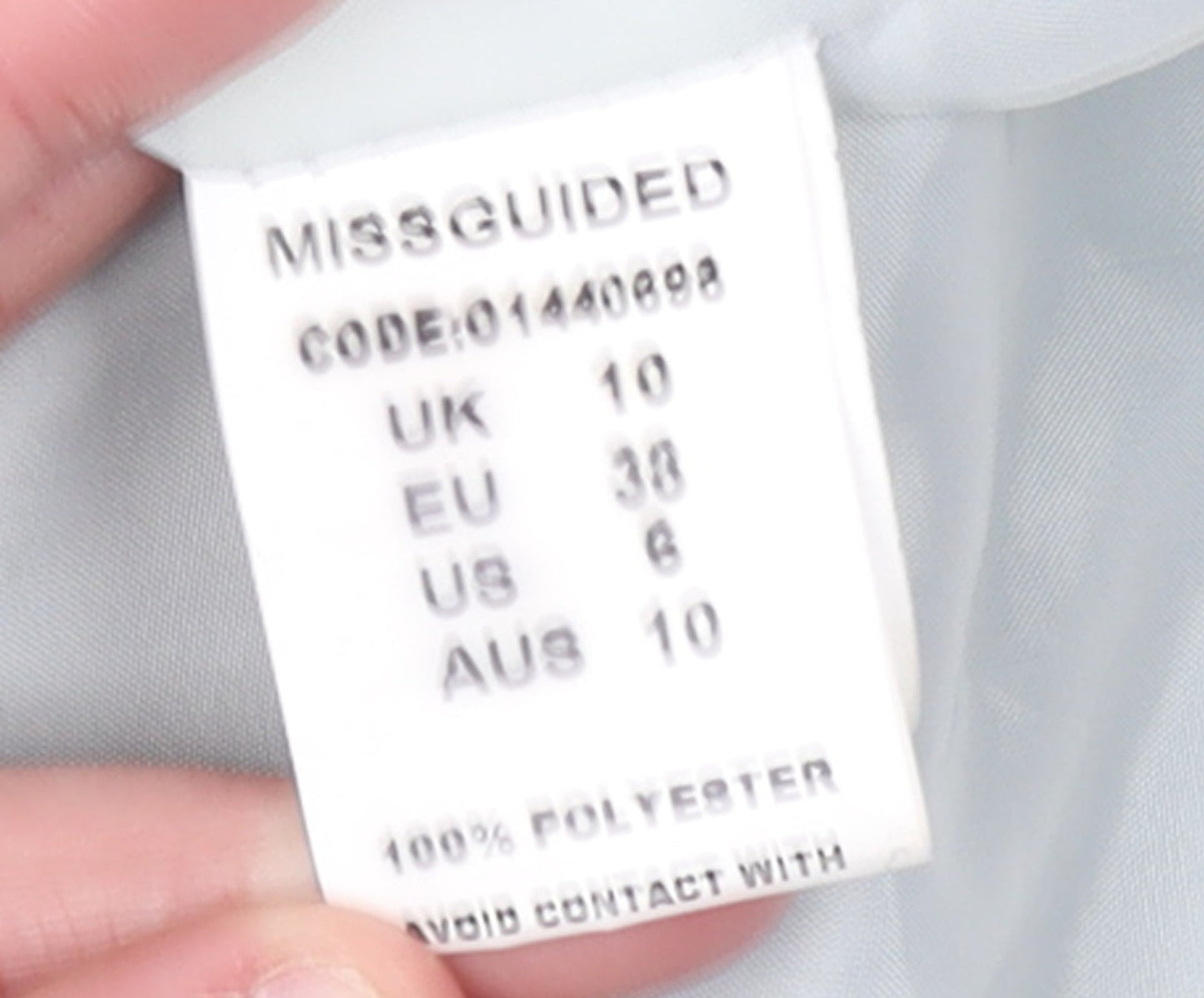 Brand and care label for Missguided Women's Grey Faux Suede Biker Jacket, size 10, Cropped Belted