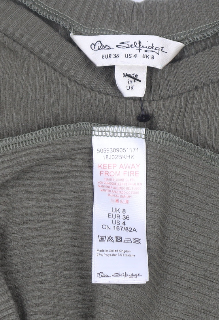 Brand and care label for Miss Selfridge Women’s Green Skater Dress, size UK 8, Long Sleeve Knit