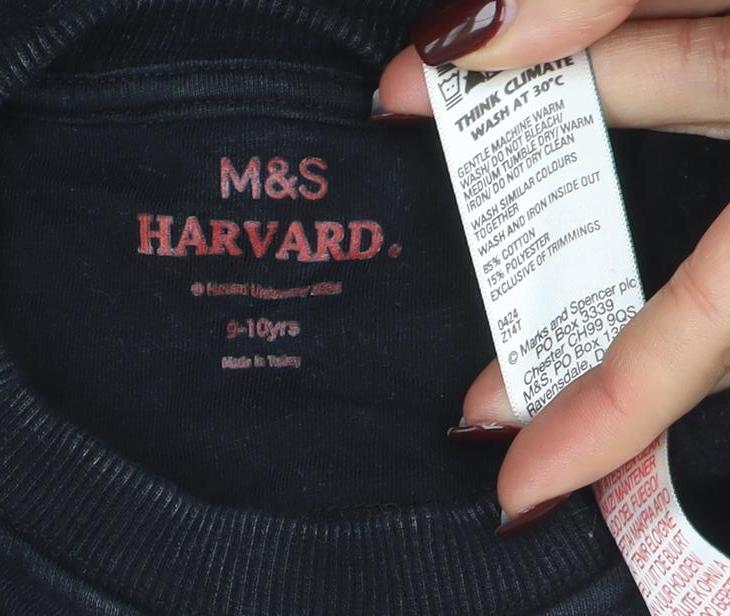 Brand and care label for Marks & Spencer girls’ black harvard graphic crew neck sweatshirt 9-10 years