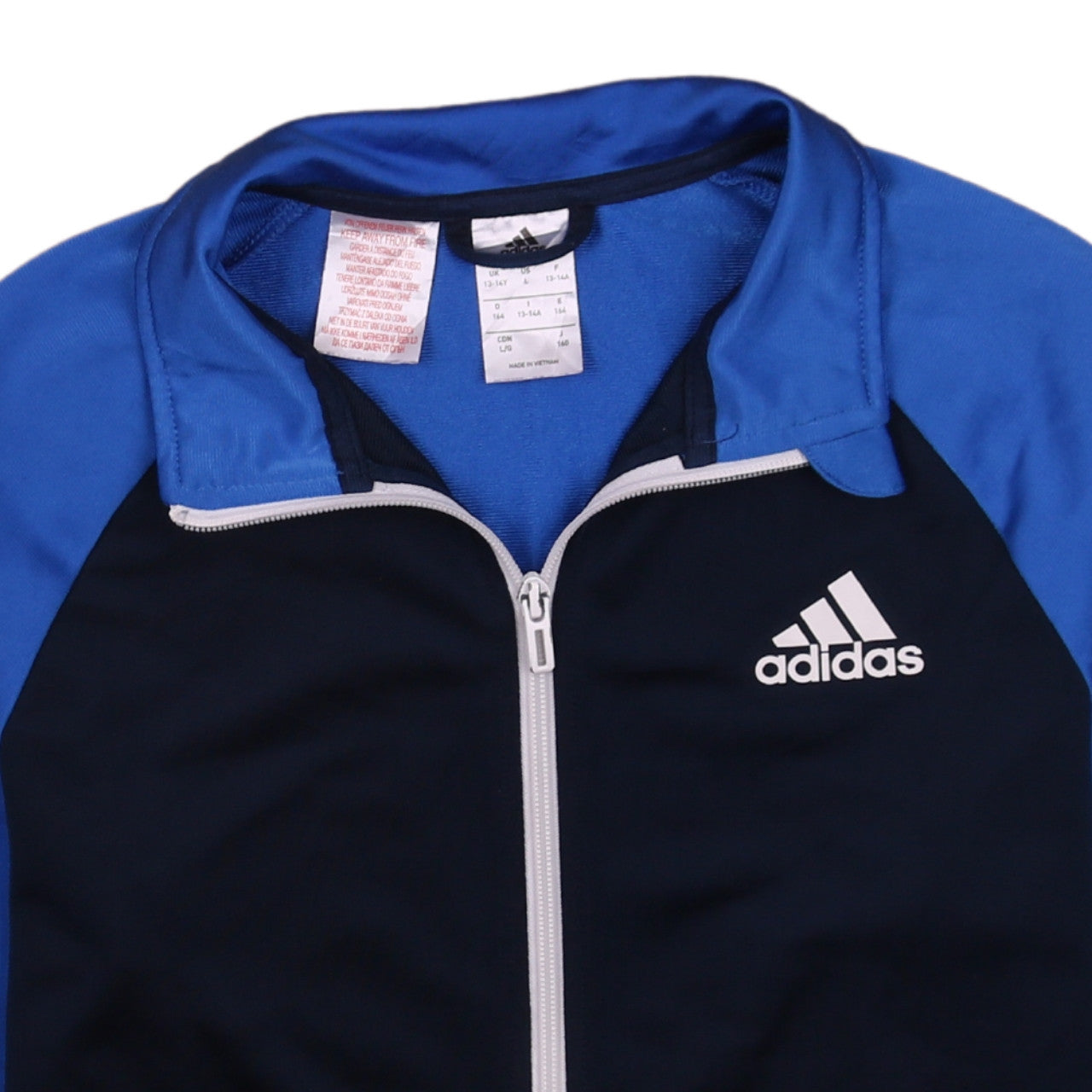 Brand and care label for Adidas boys’ blue full zip sweatshirt, size 13-14, years classic fit
