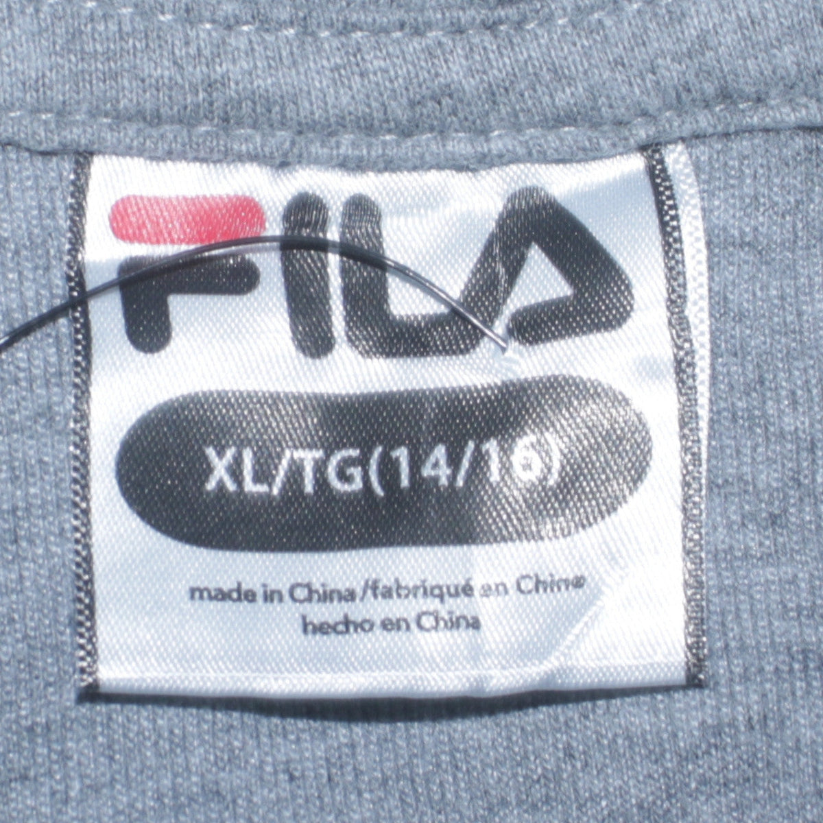 Close-up detail of Fila boys’ grey black pullover hoodie xl 14-16 years logo sportswear