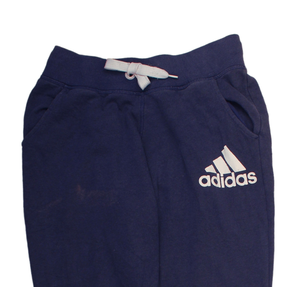Brand and care label for Adidas women’s blue jogger sweatpants s elastic waist logo