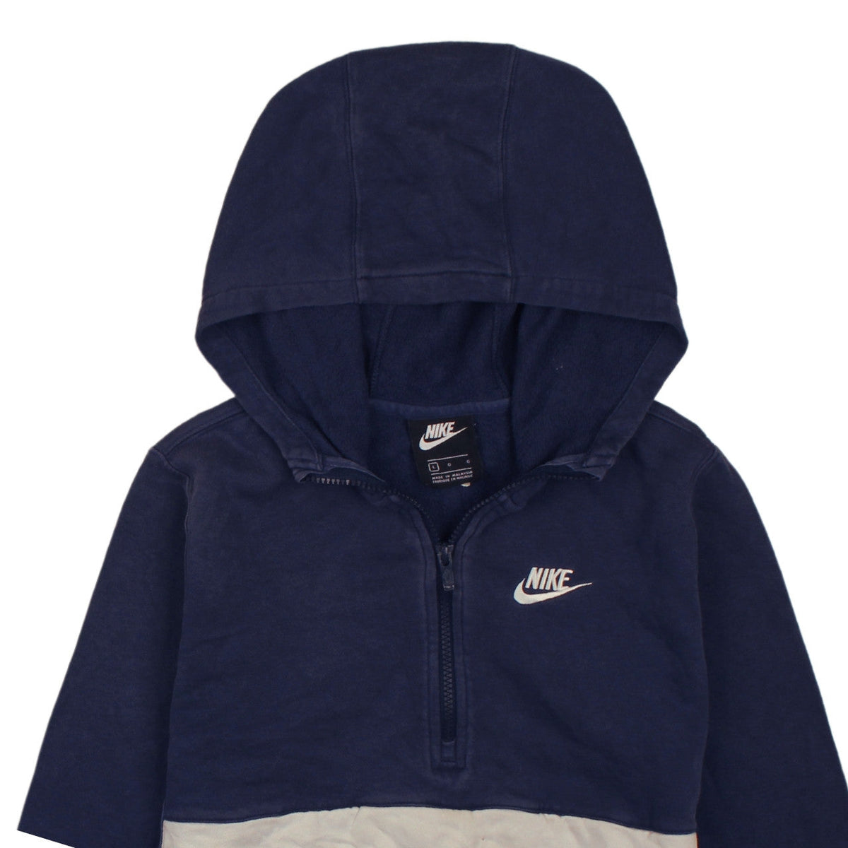 Brand and care label for Nike boys’ blue colourblock fleece 1/4 zip hoodie, size L