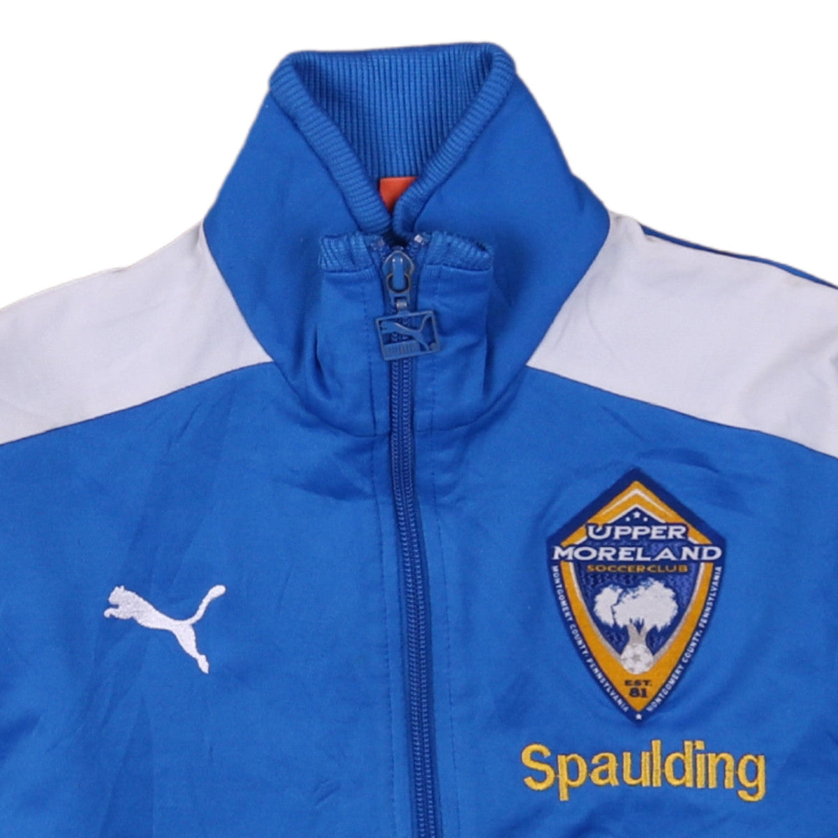 Brand and care label for Puma boys’ blue full zip soccer hoodie jacket, size 12, athletic style