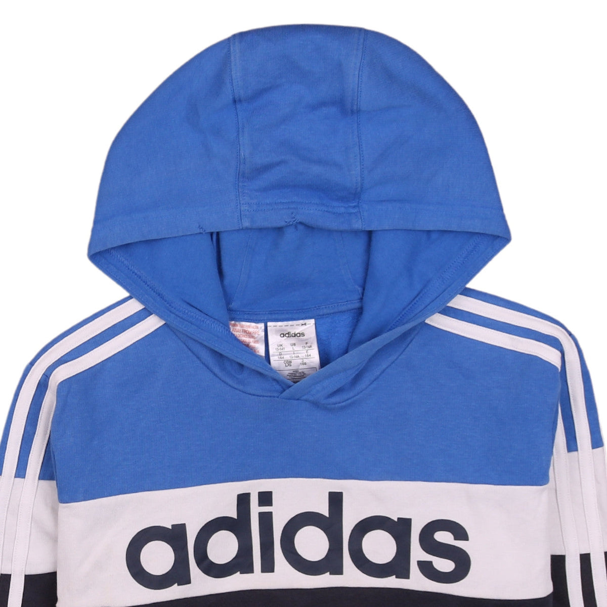Brand and care label for Adidas boys’ blue colourblock pullover hoodie, size 13-14, years