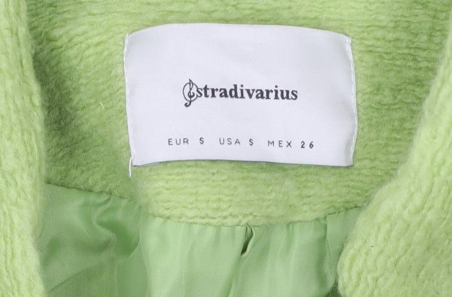 Brand and care label for Stradivarius women’s green wool blend mid-length coat, size S