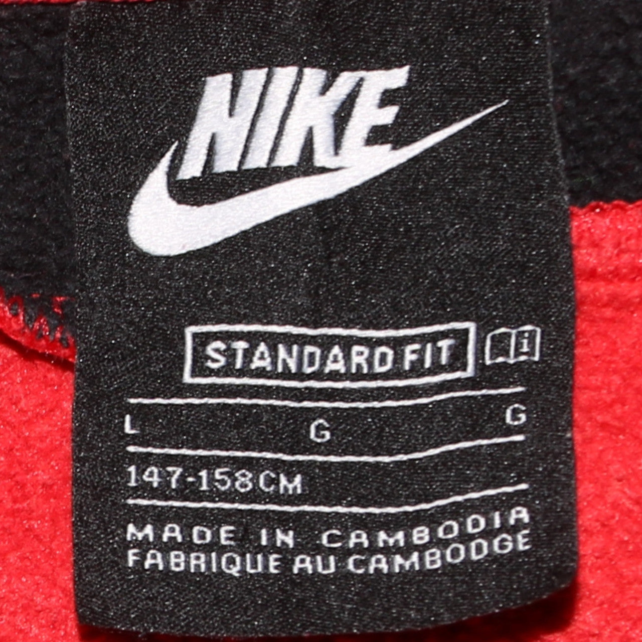 Brand and care label for Nike Teens Red Full Zip Hoodie Sweatshirt L 147-158cm Standard Fit
