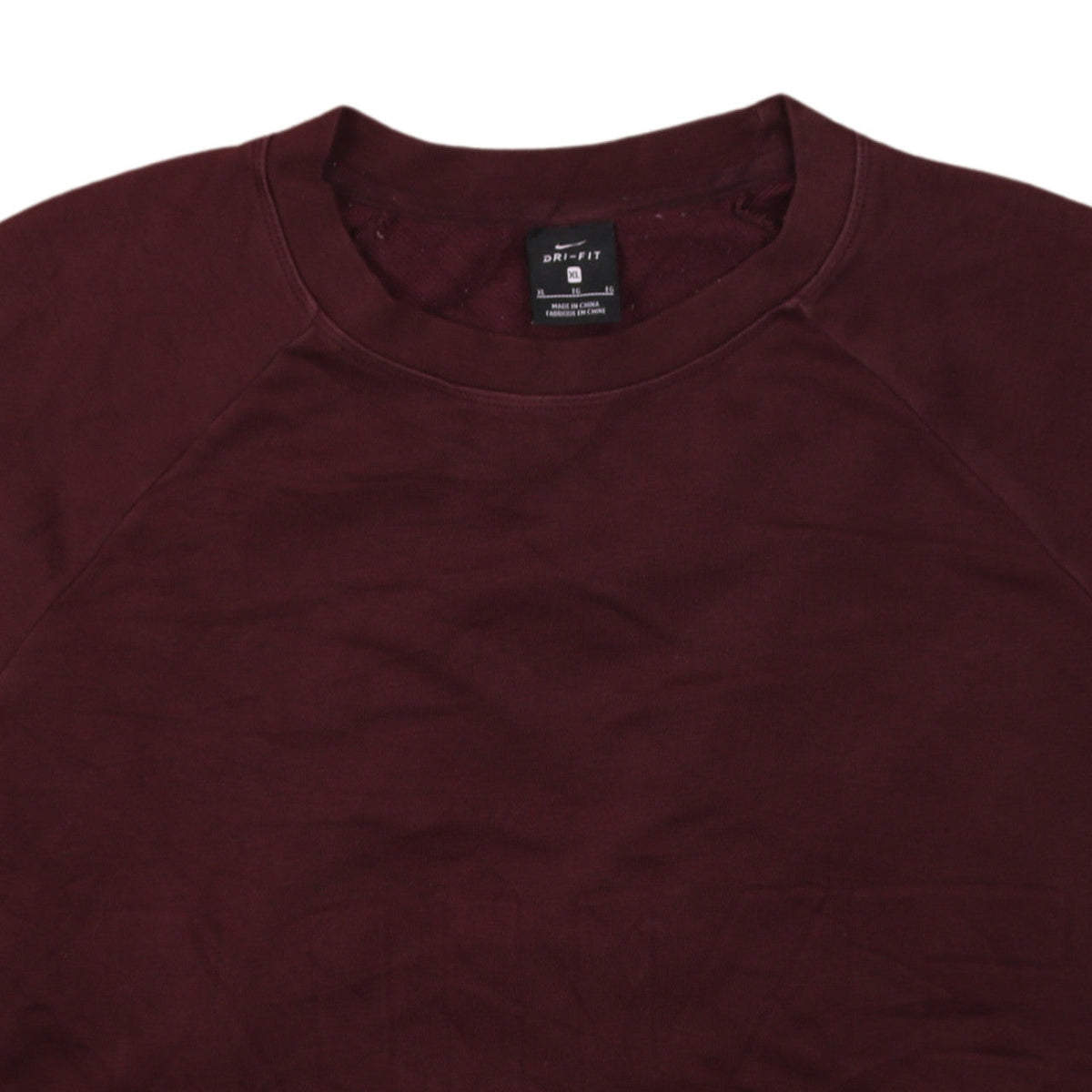 Brand and care label for Nike Women’s Burgundy Dri-Fit Sweatshirt XL Crew Neck Pullover