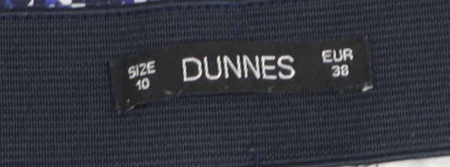 Brand and care label for Dunnes women’s blue geometric slim tapered trousers, size UK 10