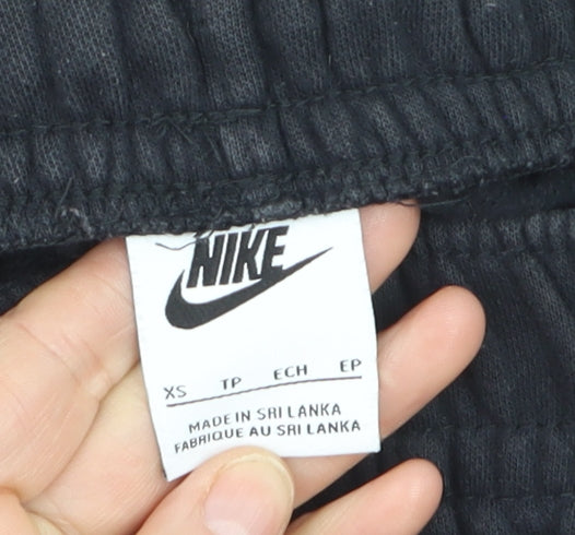Brand and care label for Nike boys’ black xs fleece jogger sweatpants activewear trousers