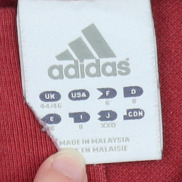 Brand and care label for Adidas Men's Red Short Sleeve Polo Shirt, size XL, Classic Fit