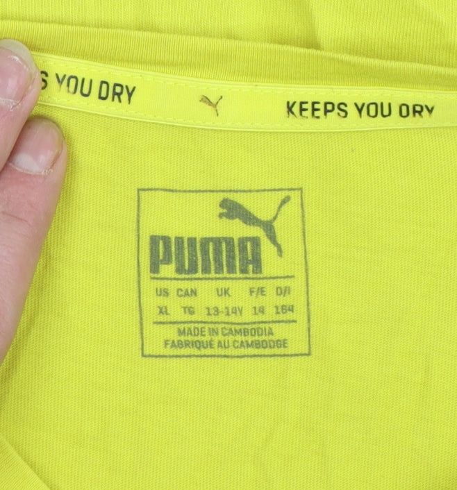 Brand and care label for Puma boys’ yellow graphic logo sports t-shirt 13-14 years