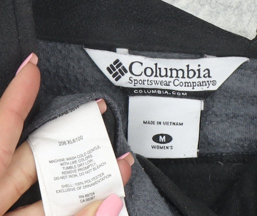 Brand and care label for Columbia unisex adults black fleece full zip outdoor jacket m