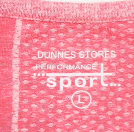 Brand and care label for Dunnes Women’s Pink Performance Sport T-Shirt L