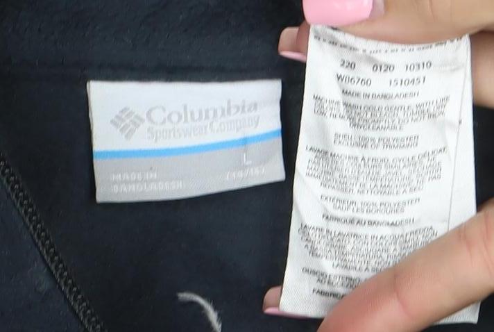 Brand and care label for Columbia boys’ black fleece full zip jacket, size L, warm outdoor layer