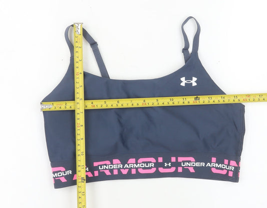 Back view of Under Armour women’s navy medium sports bra adjustable straps