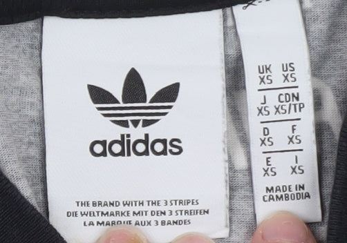 Brand and care label for Adidas Men's Black Graphic Print Crew Neck Short Sleeve T-Shirt XS