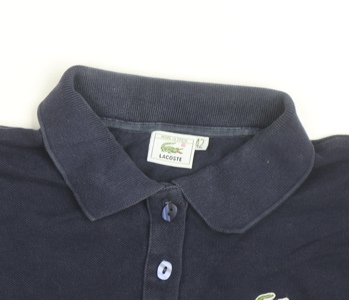Brand and care label for Lacoste Women's Navy Blue Polo Shirt, size 14, Classic Cotton